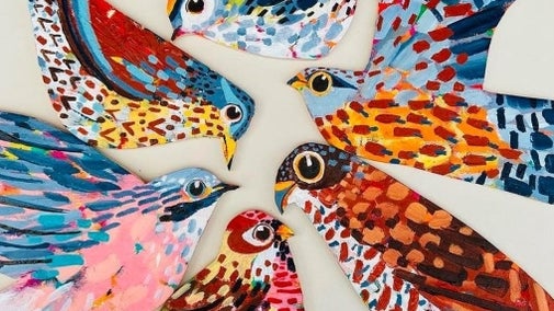 Colourful painted birds created by artist Claire West